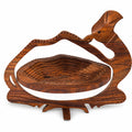 Hand-carved wooden camel tray opened for fruit and snack serving