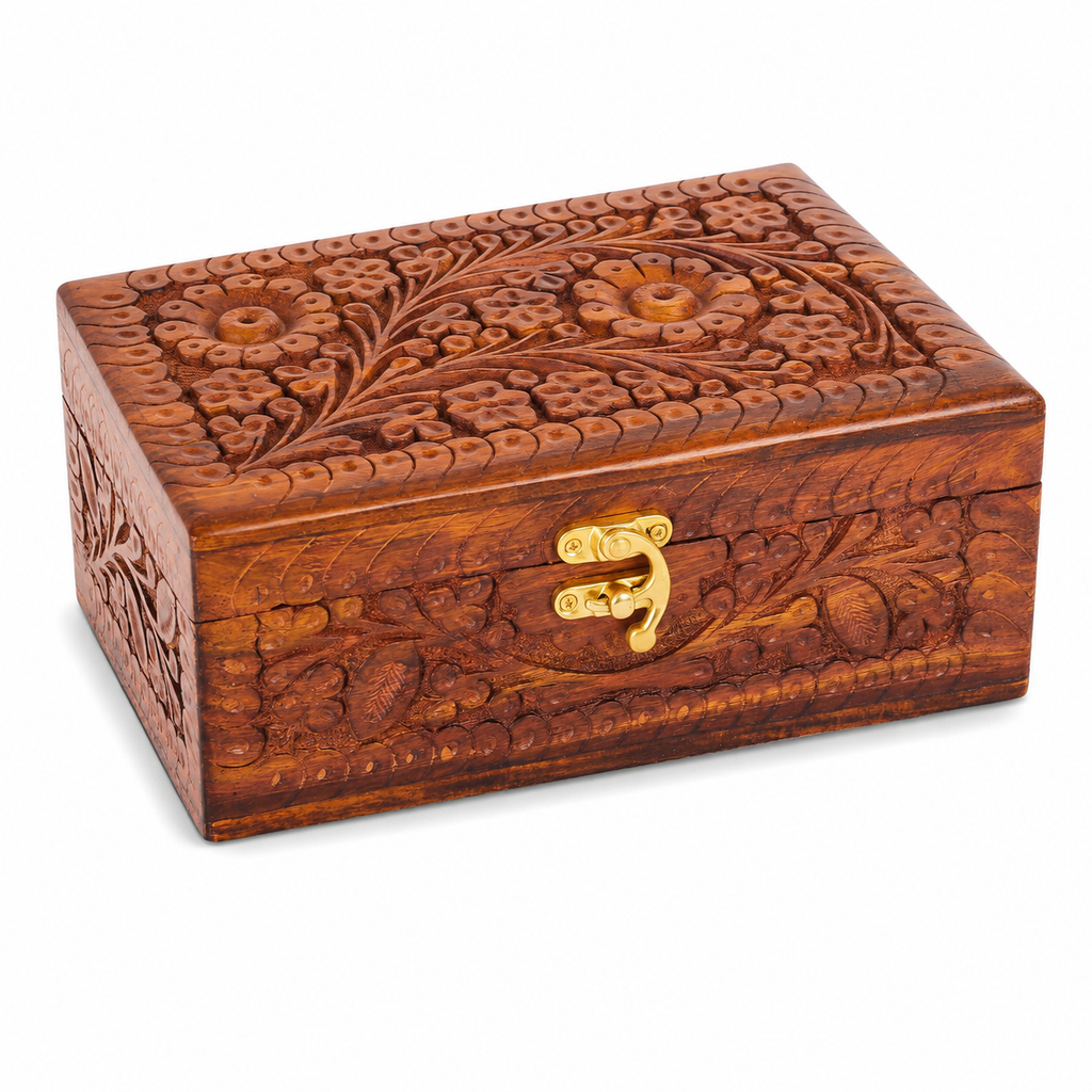Large wooden jewelry box with decorative carving and brass latch