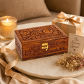 Large handcrafted rosewood jewelry box with carved wooden design